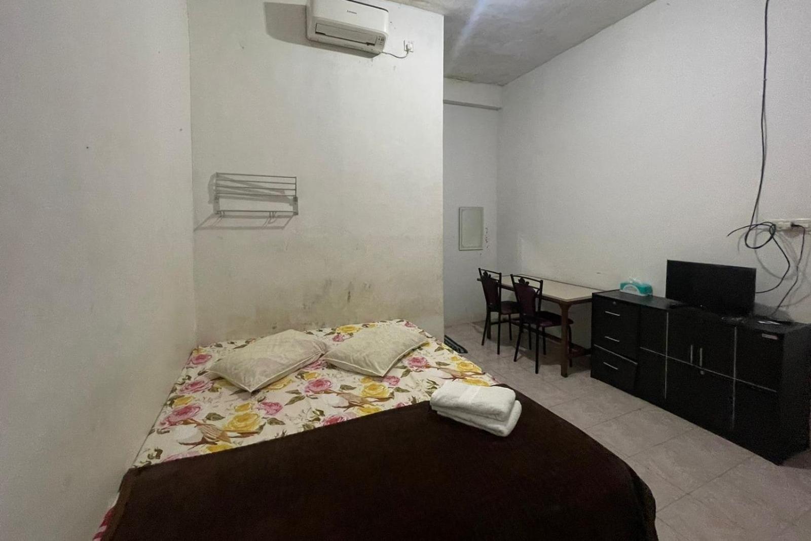 Oyo 93849 Kng Syariah Hotel